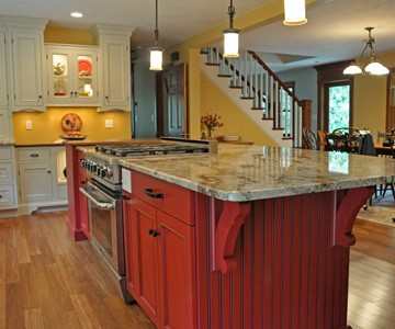 center island featuring cookstove and storage