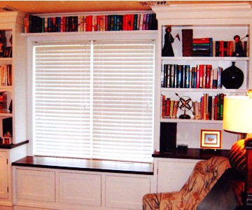 cozy window seat and book shelves