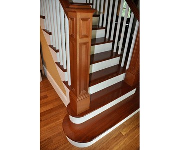 handcrafted staircase - newel post and custom curve